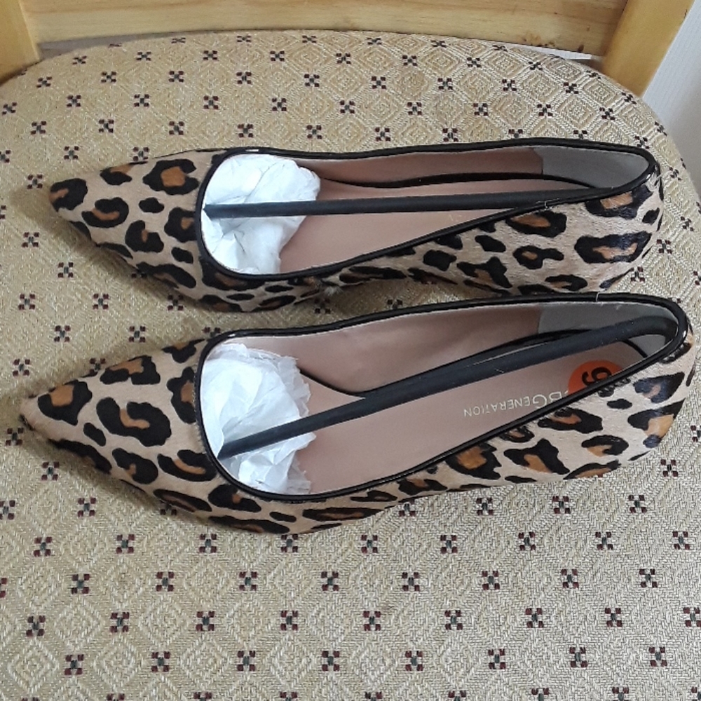 BCBG animal print pumps. Size 9.5